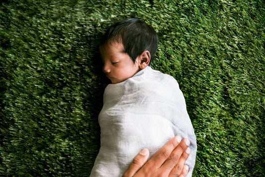 What is a swaddling blanket and swaddling?